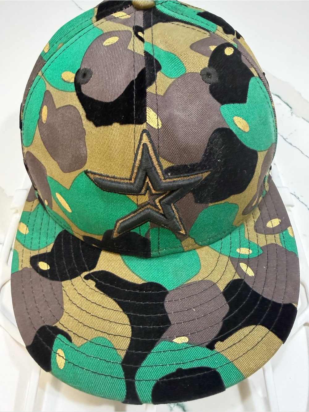 Houston Astro’s Camouflage with black velvet and metallic gold designs